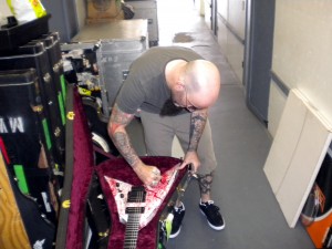 Scott Ian of Anthrax signs his guitar pre-auction. Photo courtesy of Backstage Auctions.